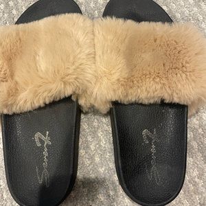 Furry slippers/ slides